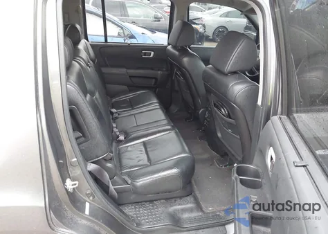 2011 Honda Pilot Touring z USA, uszkodzony, nr VIN 5FNYF4H91BB053077